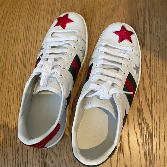 Gucci sneakers with stars.